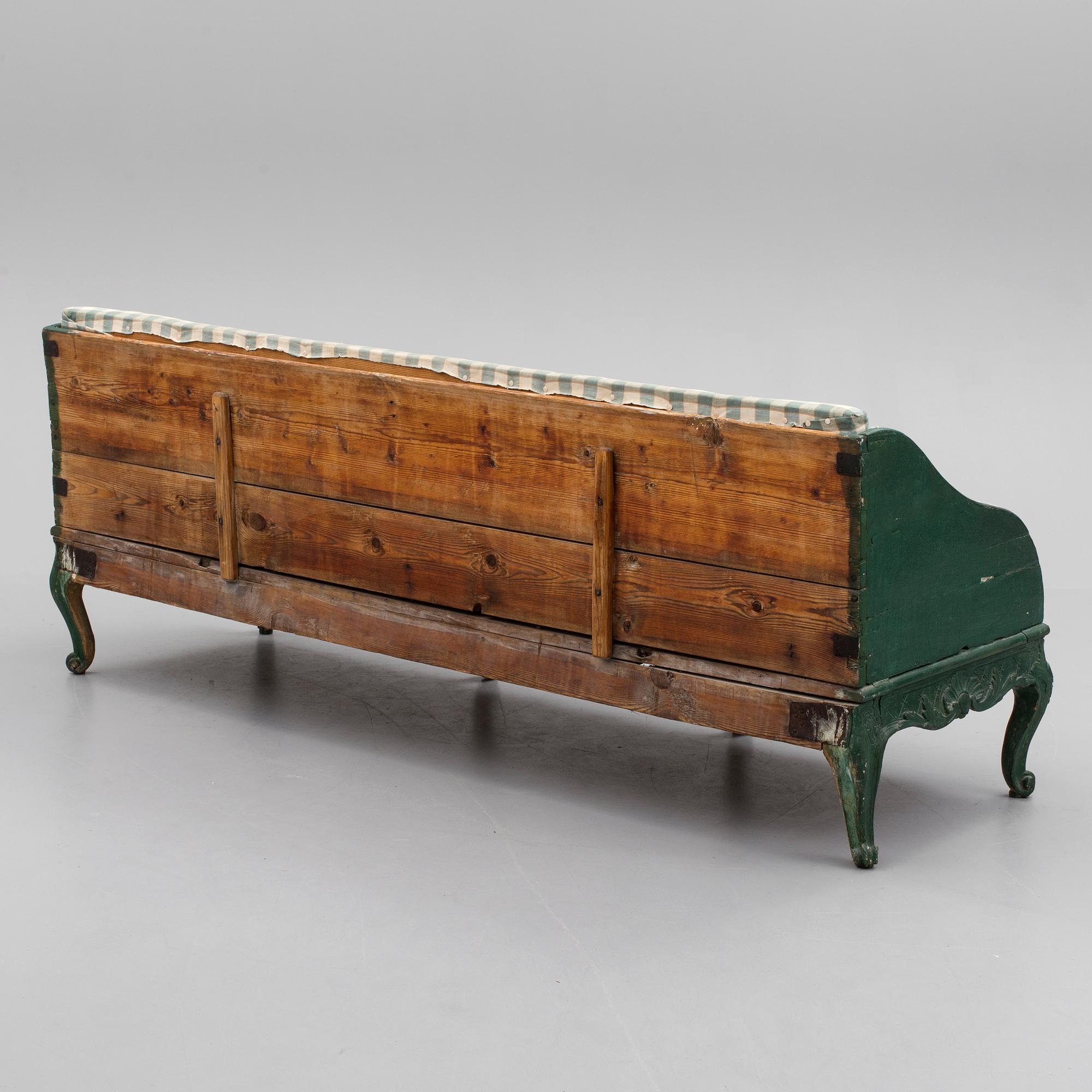 A mid 18th century rococo sofa.