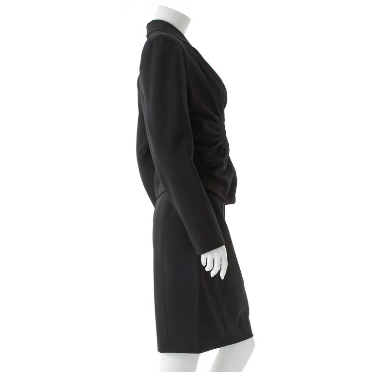 JOHN GALLIANO, a three-piece suit consisting of jacket and pants from the 1980s.