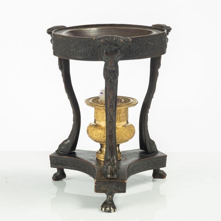 A French Empire ormolu and patinated brûle-parfume, early 19th century.