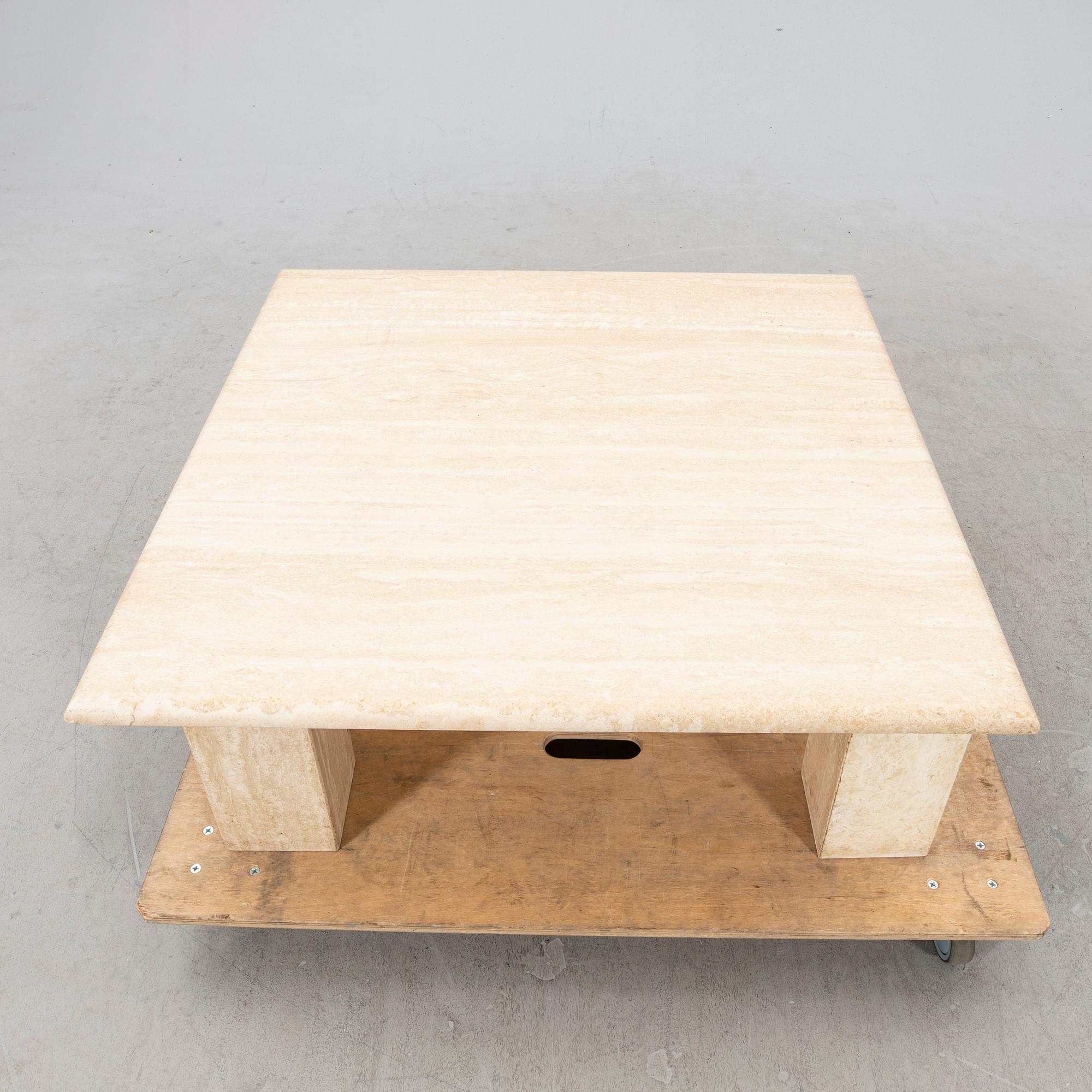 A late 20th vcentury travertine coffee table.