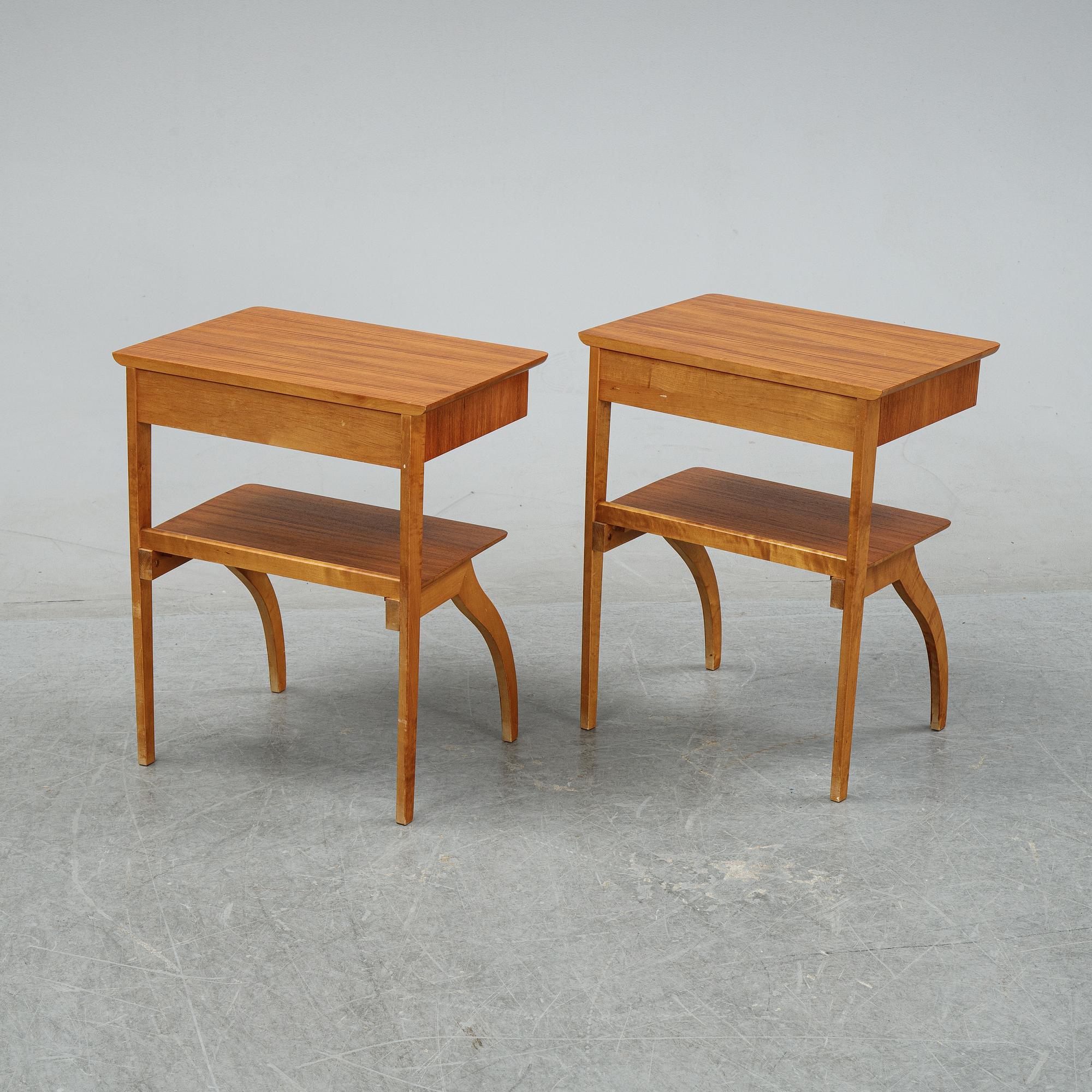 A pair of teak and birch bedside tables, mid 20th Century.
