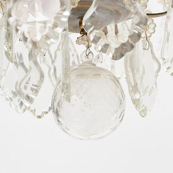 A rococo style chandelier, early 20th Century.