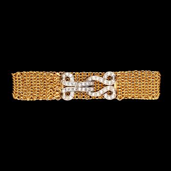 947. ARMBAND, guld, lås med rosenslipade diamanter, tot. ca 1 ct. Sekelskifte 1900.