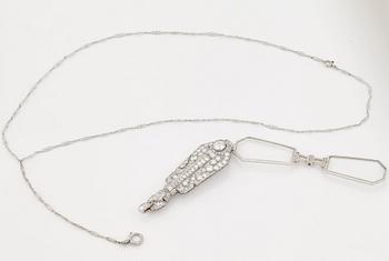 A pair of lorgnettes set with old- single- and baguette cut diamonds.