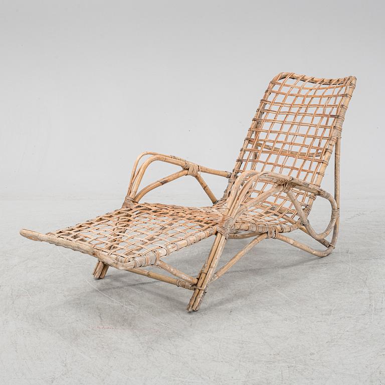 Rattan sun bed/recliner/deck chair, mid 20th Century.