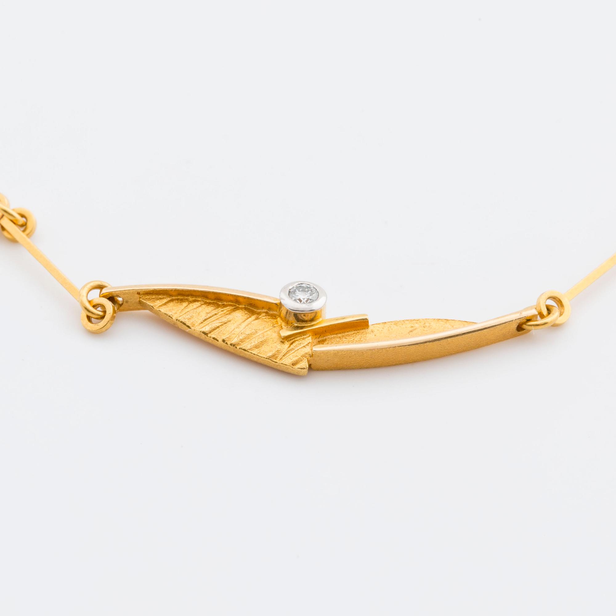 LAPPONIA NECKLACE 18K gold 1 brilliant-cut diamond 0,03 ct engraved, Finland 2002.