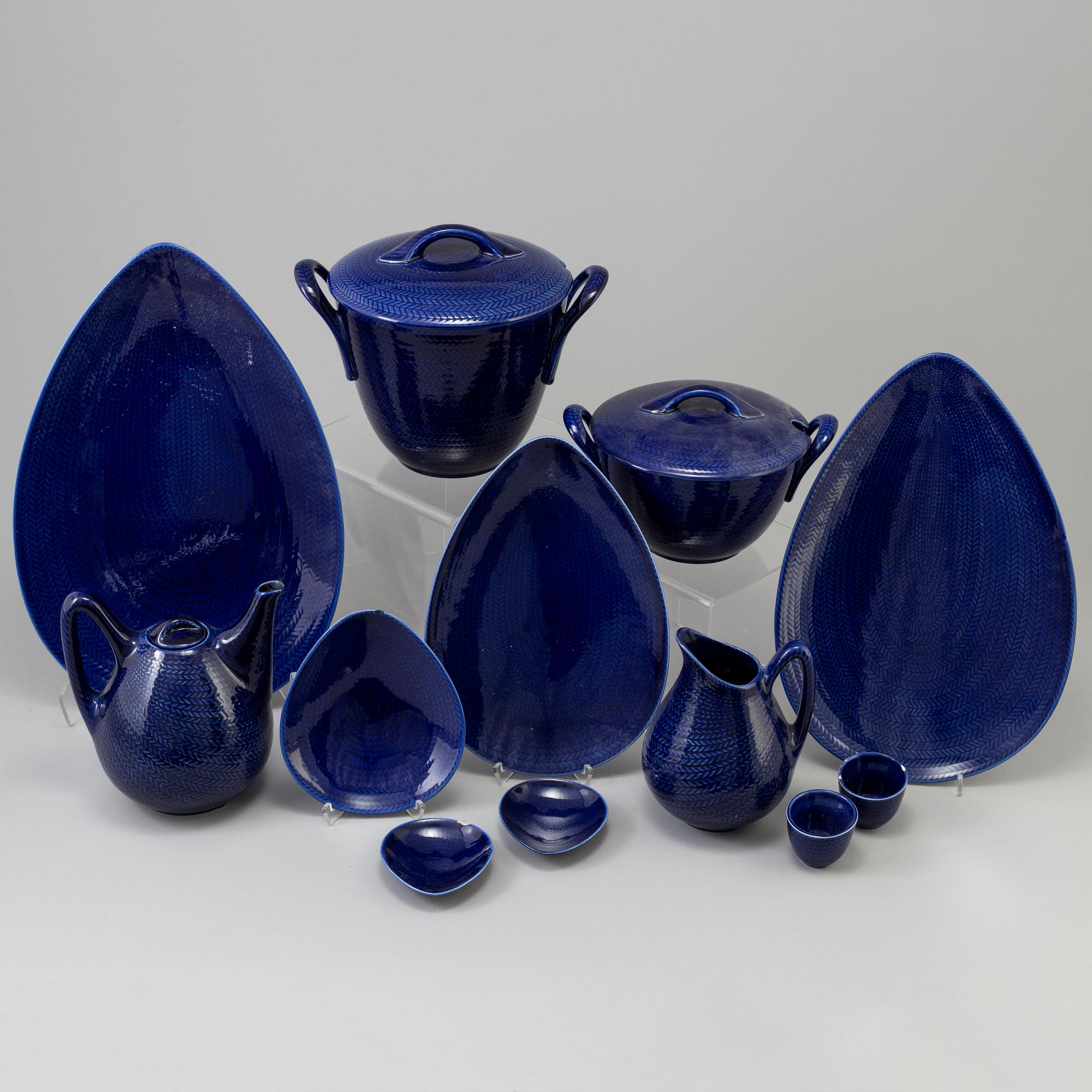 A Swedish Rörstrand 'Blå Eld' part dinner service. Design by Herta Bengtsson. (41 pieces).