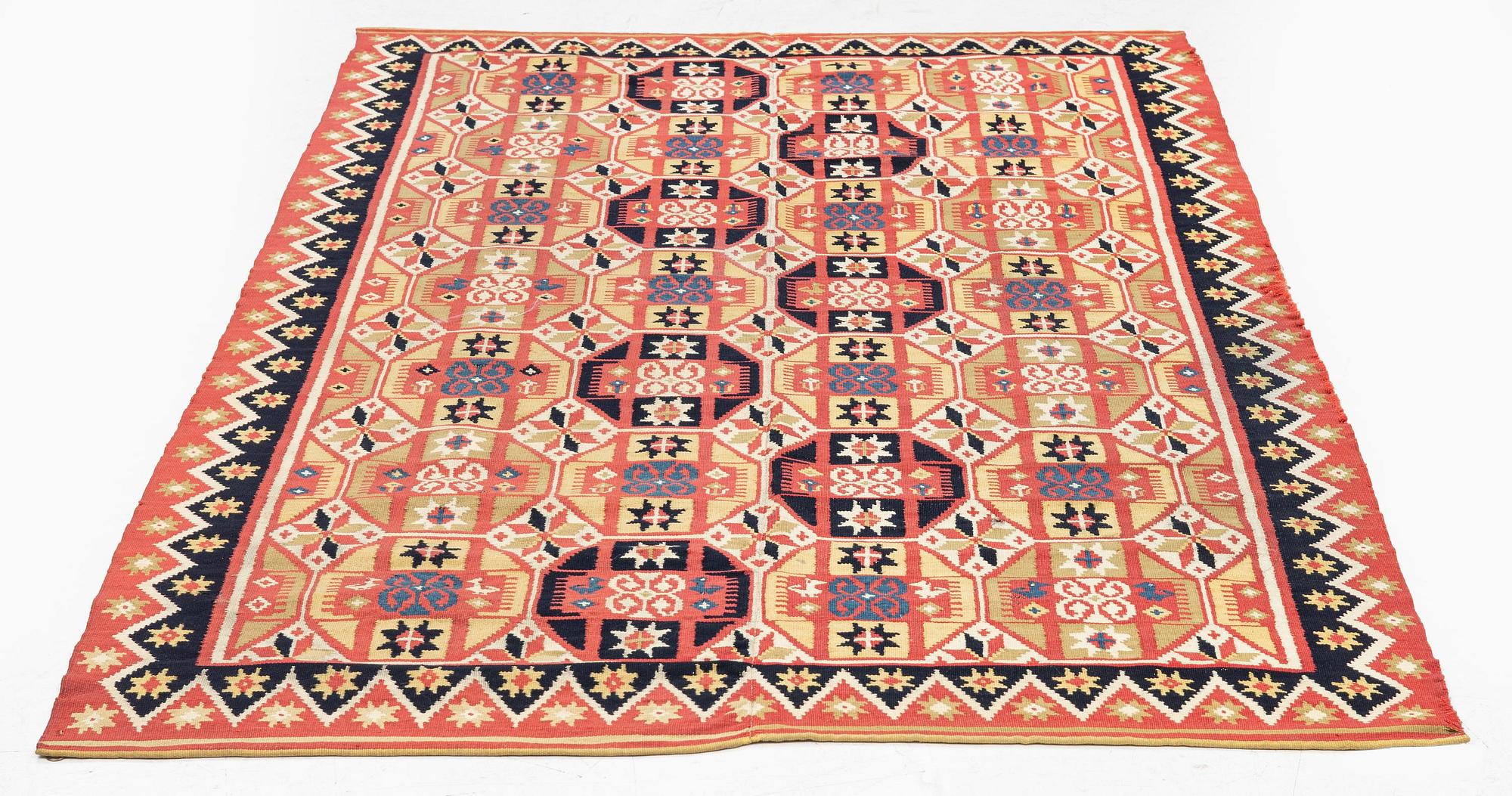 A double-interlocked tapestry bed cover, c. 188 x 116 cm, Scania, Färs, Gärds or Villands district, around 1800-1830.