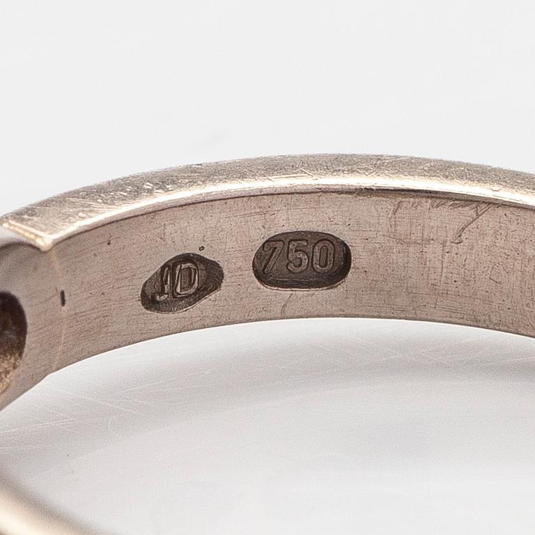 Sormus, 18K palladiumvalkokultaa, ovaalihiottu safiiri ja timantteja.