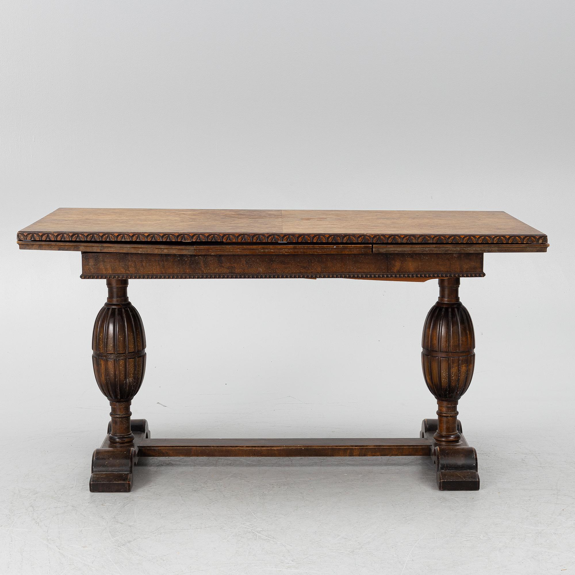 A dining table, 1920s.