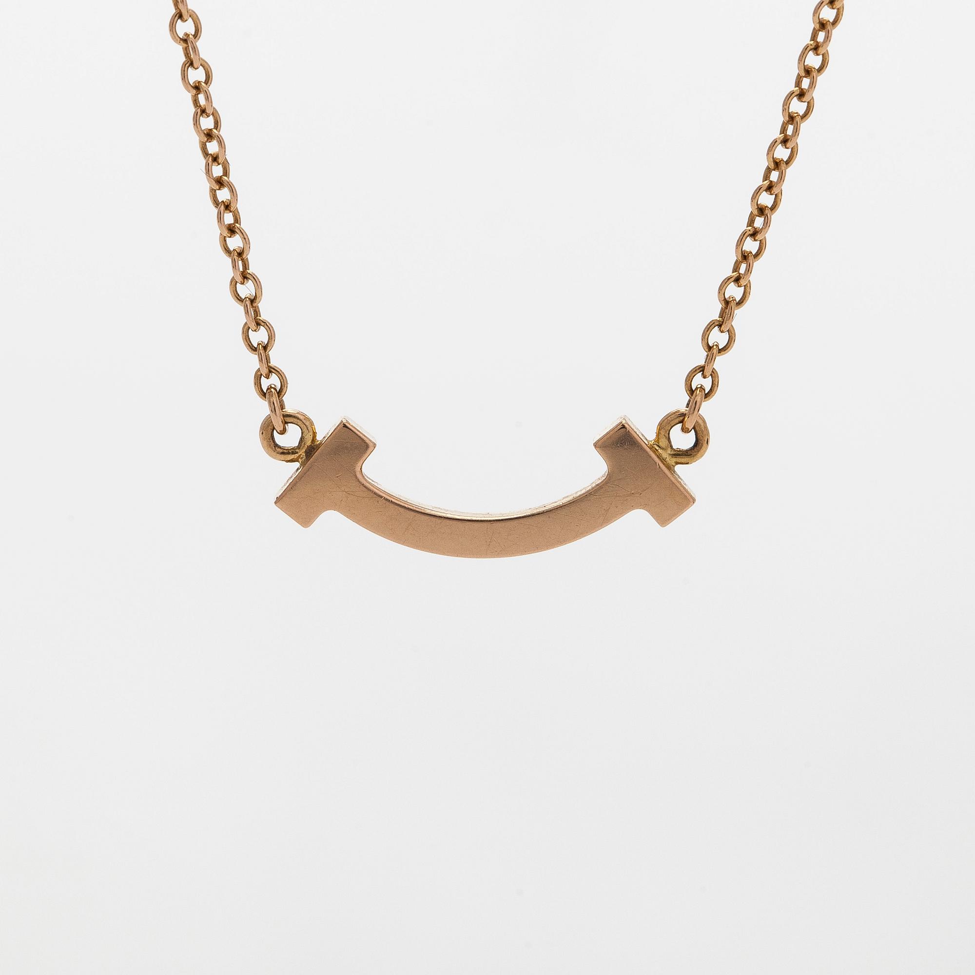 Tiffany & Co, kaulakoru, "T Smile", 18K kultaa ja briljanttihiottuja timantteja.