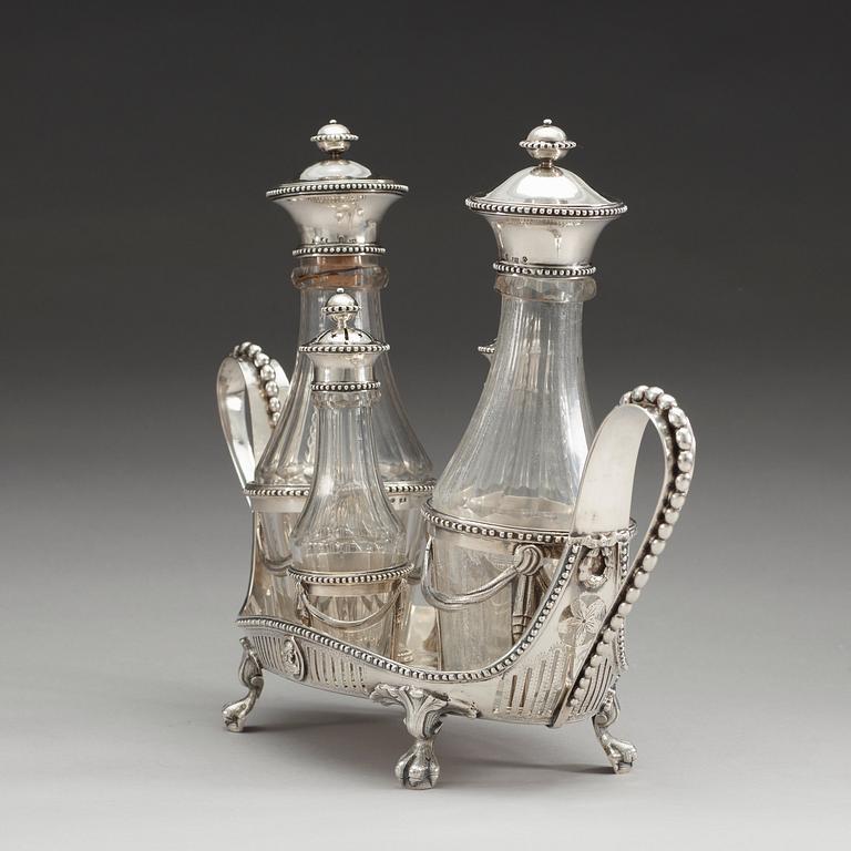 BORDSSURTOUT för fyra flaskor, av Petter Eneroth, Stockholm 1787. Gustaviansk.