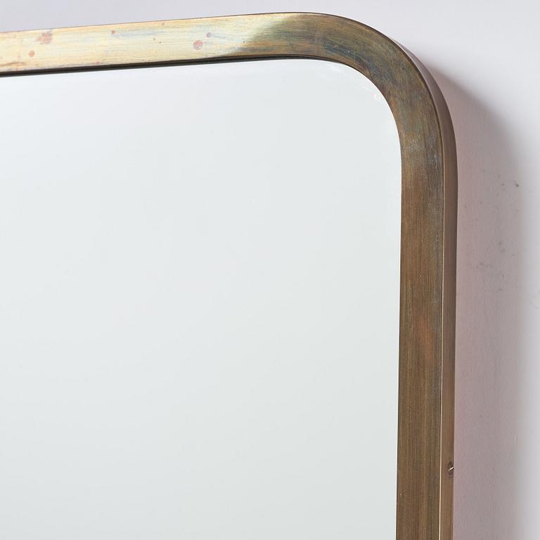 Swedish Modern, a brass framed mirror, 1940s-1950s.
