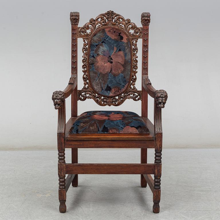 A Baroque style oak armchair, first half of the 20th Century.