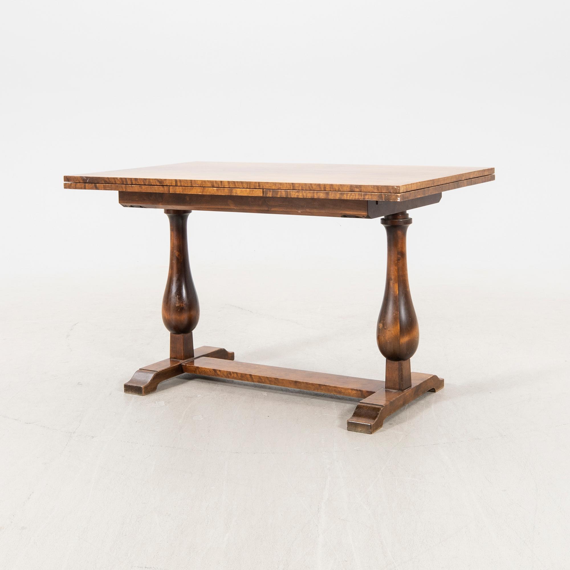 A 1940s birch dining table/library table.
