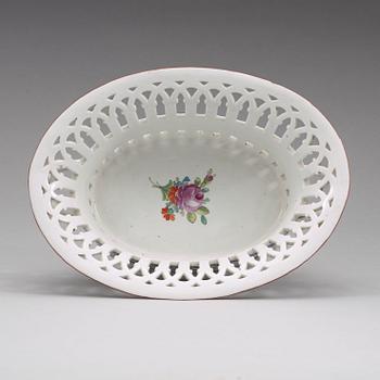 A Russian chesnut basket and stand, Imperial Porcelain Manufactory, St Petersburg, period of Alexander I (1801-25).