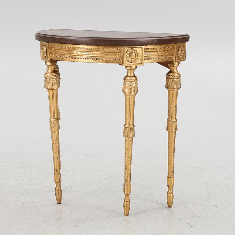 A Gustavian giltwood console table, late 18th century.