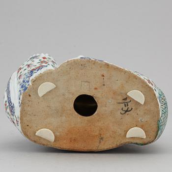 A large Chinese famille rose buddha, 20th century.