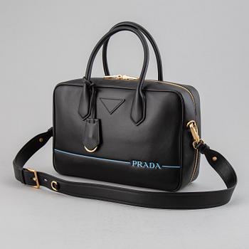 PRADA, a leather bag.