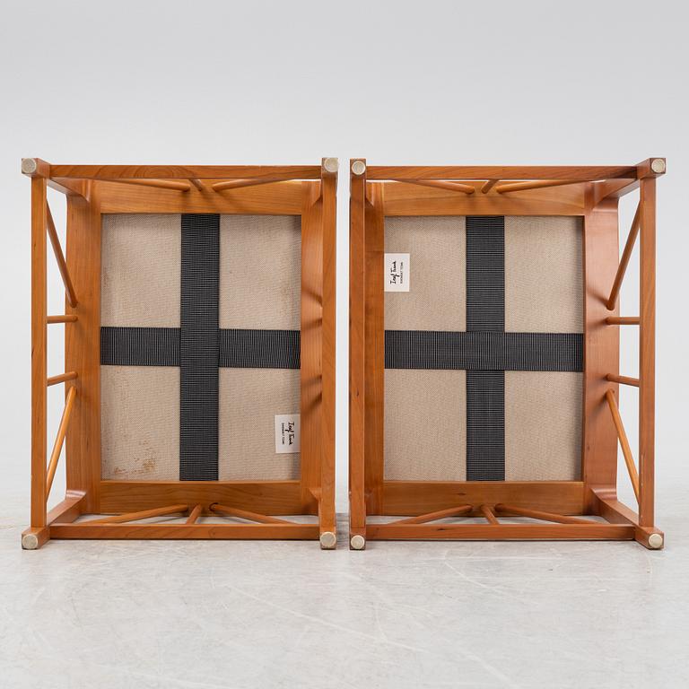 Josef Frank, a pair of model 1063 cherry wood stools, Firma Svenskt Tenn, Sweden 21st century.