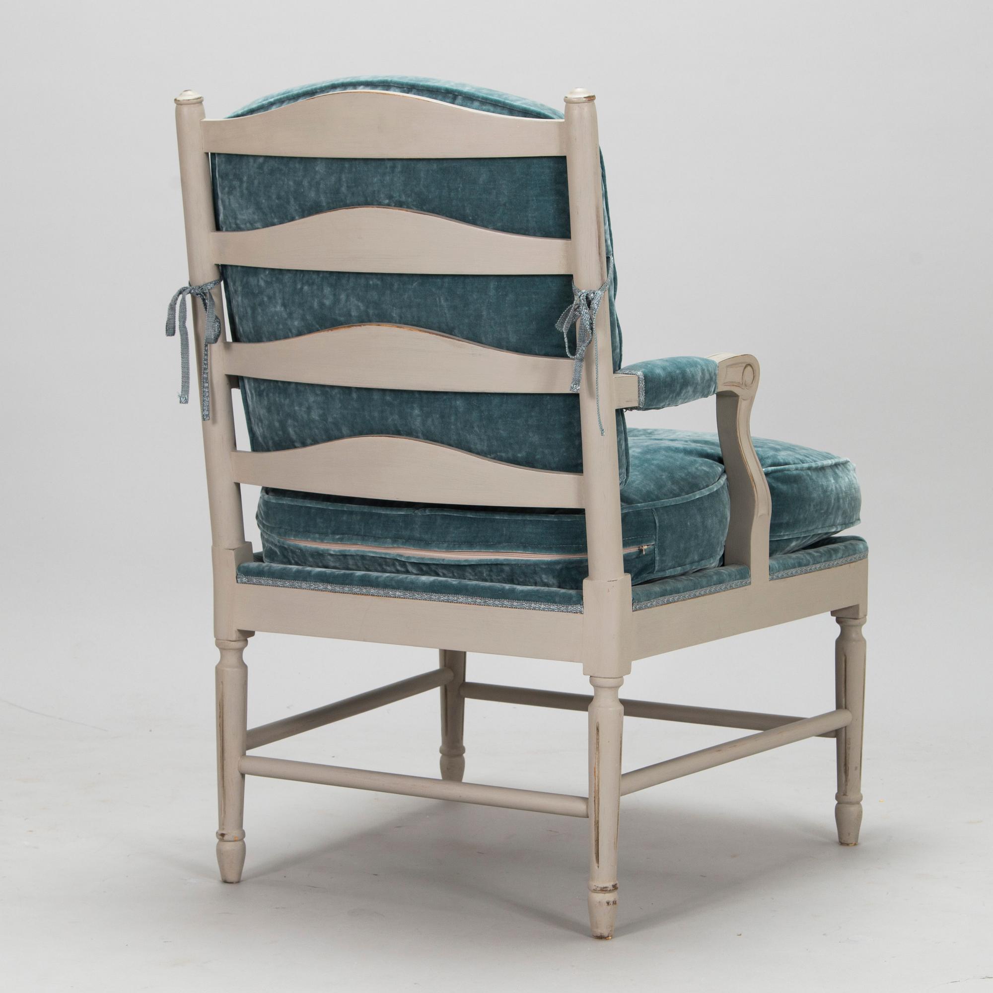 A Gustavian style armchair from the latter half of the 20th century.