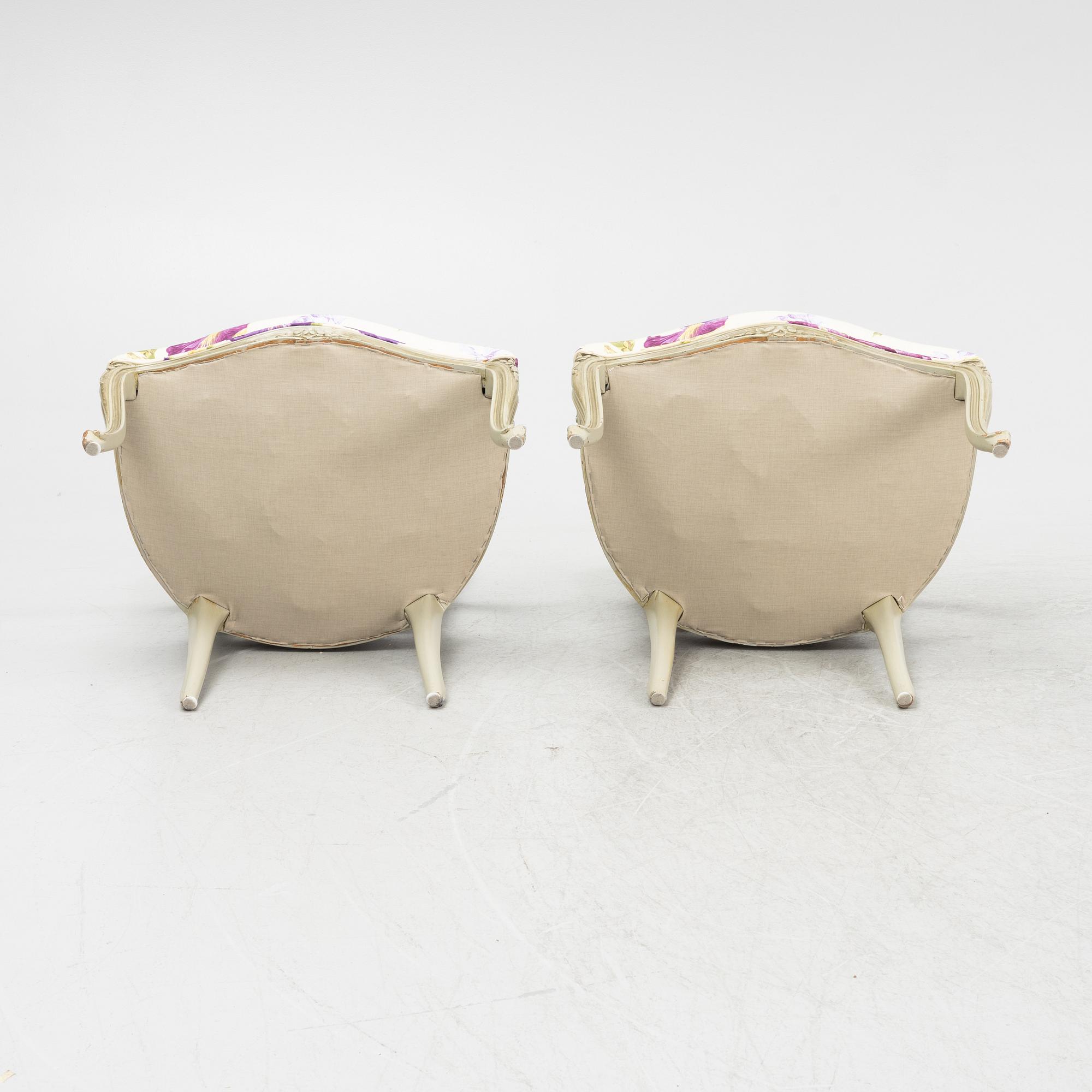 A pair of rococo style armchairs, 20th Century.