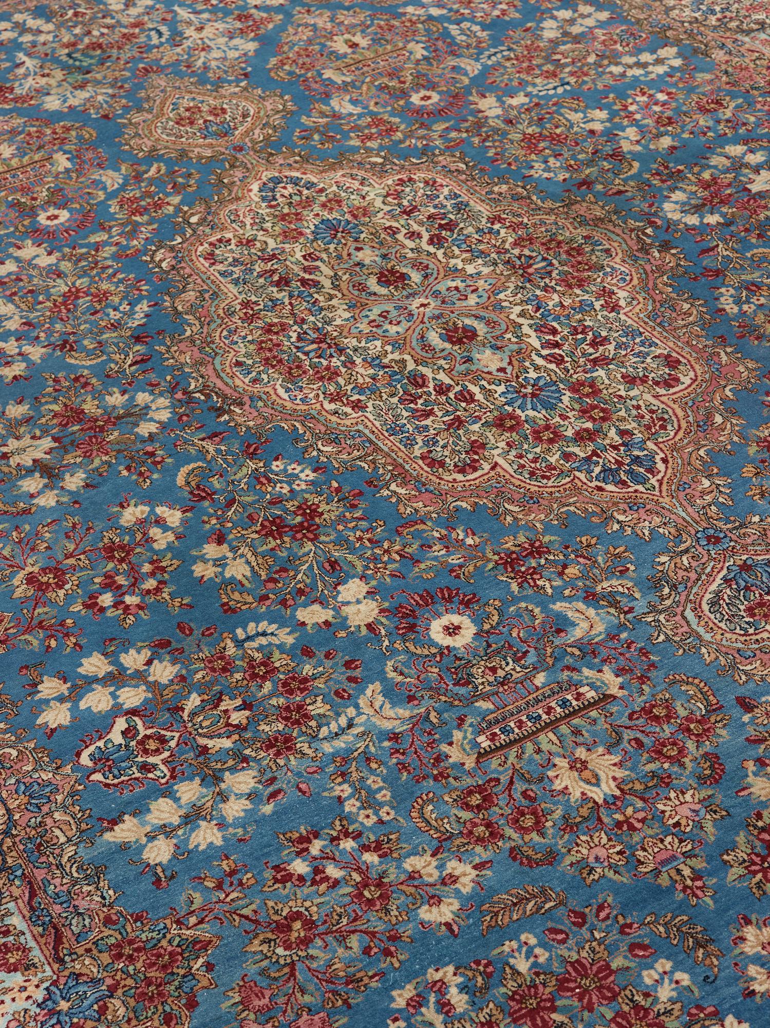 A semi-antique Kerman carpet,  440 x 296 cm.