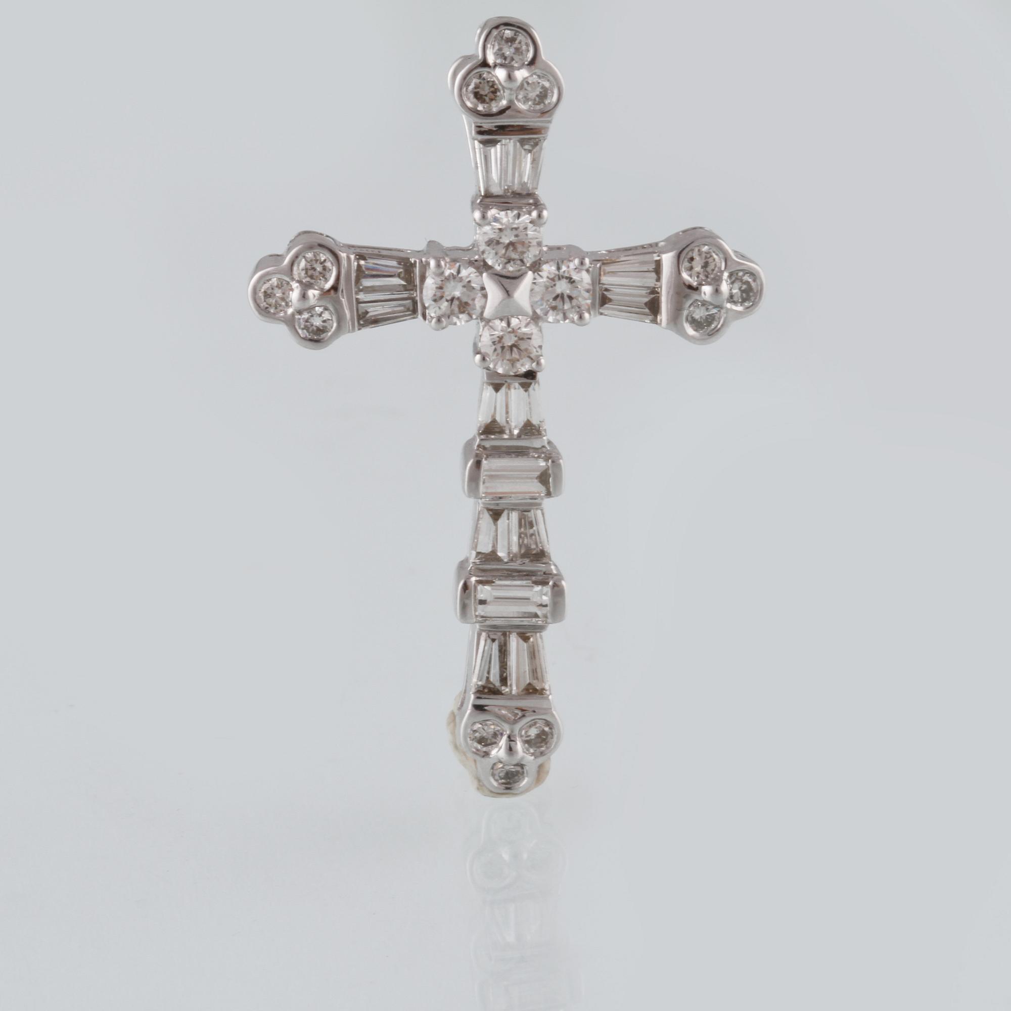 HÄNGE, 18K vitguld med 16 briljantslipade och 14 baguettslipade diamanter, 1.18 ct. Vikt 4,1 gram.
