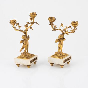A pair of Louis XVI style candelabras, 20th century.