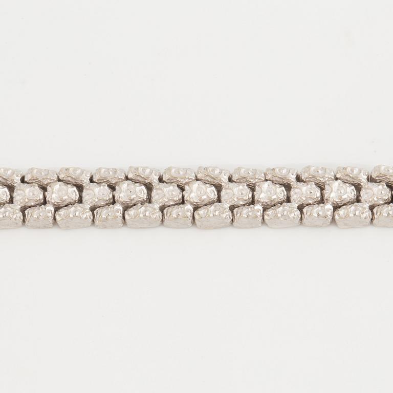 A fancy-link bracelet.