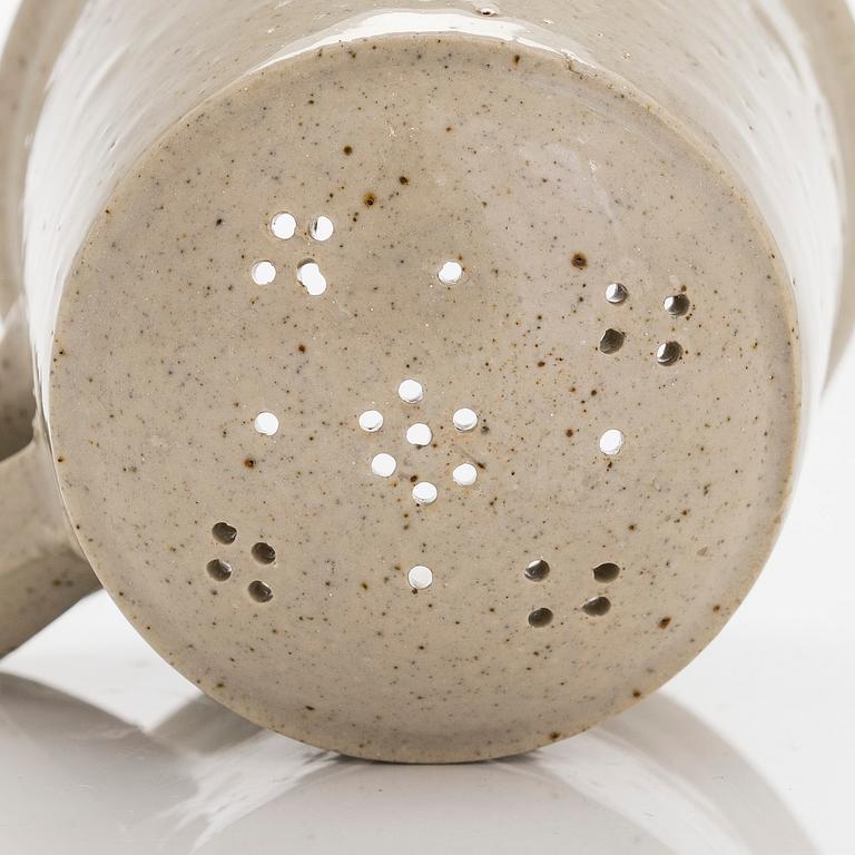 Kyllikki Salmenhaara, a stoneware tea strainer signed KS.