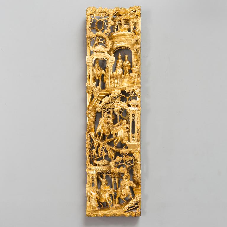 A Chinese carved and gilt wood panel, 20th century.