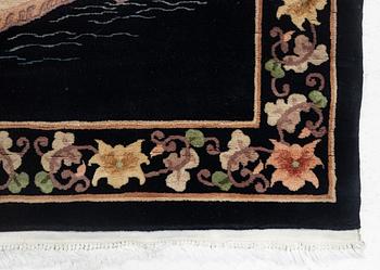 A Chinese rug, c. 183 x 120 cm.