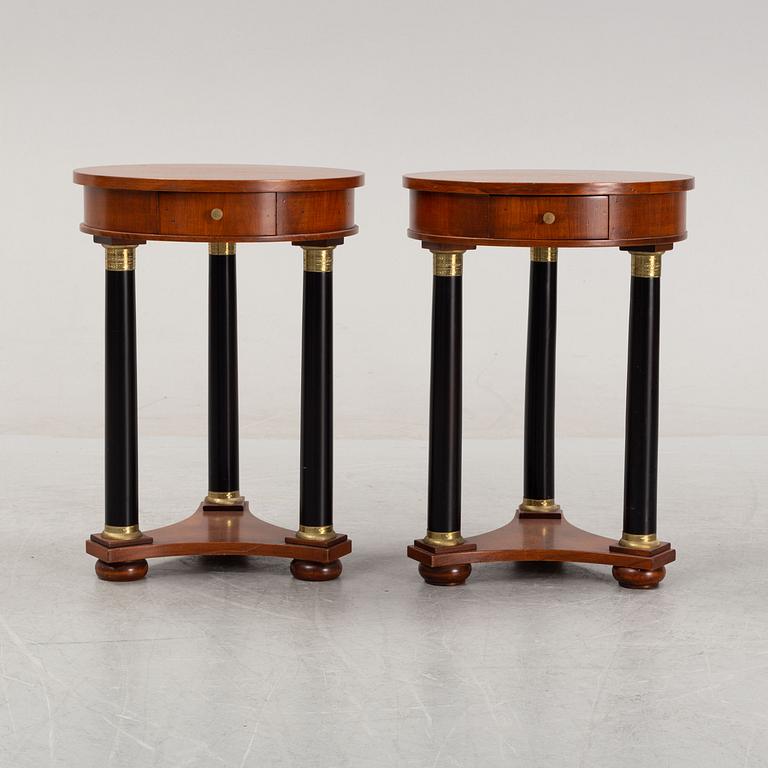 A pair of empire style side tables from Fiorini Furniture, Italy.