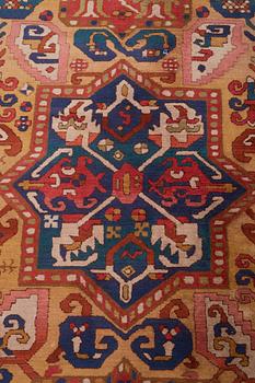 A CARPET, a semi-antique Vorwerk, ca 242,5 x 130 cm.