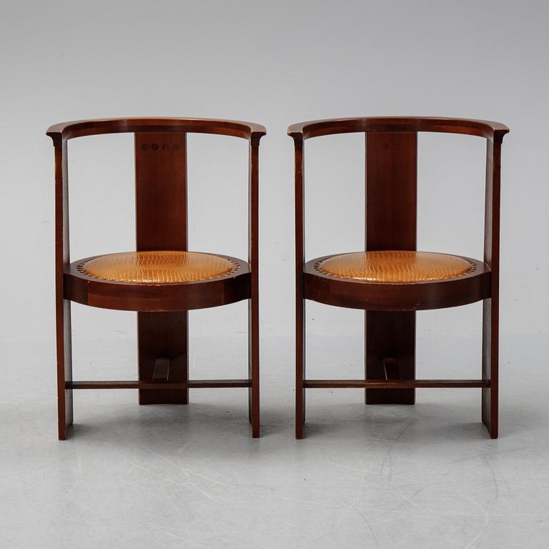 Eliel Saarinen, a pair of 'Hannes'' mahogany armchairs, Adelta Oy, Finland, 1983.