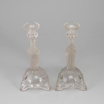 A pair of moulded glass candlesticks, late 19th century.