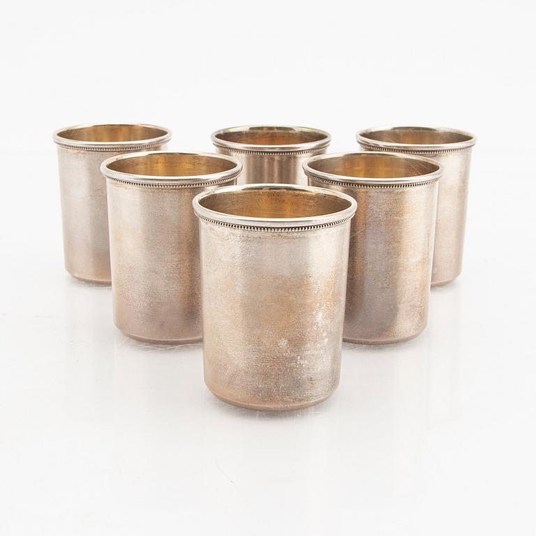 An eraly 20th century set of six silver cups mark of  Ivan Ekimovich Morozov St Petersburg weight 130 grams.