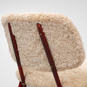 Alf Svensson, a pair of 'TeVe' easy chairs with new sheepskin upholstery, 1950s.