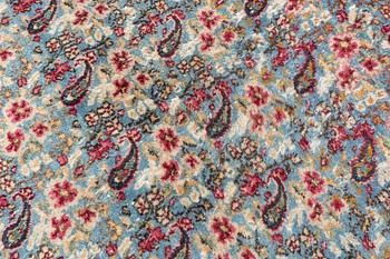 A Persian rug, c. 220 x 140 cm.