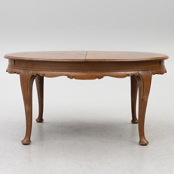 Dining table, 8 chairs, 2 armchairs, sideboard, Rococo style, early 20th century.