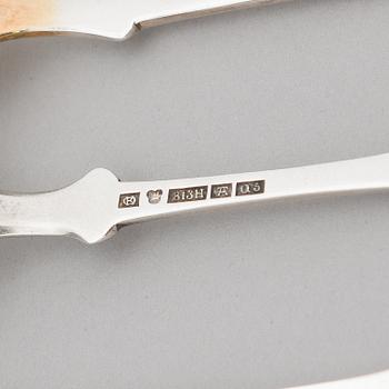 A 42-piece set of silver cutlery with seashell decorated handles, Finnish hallmarks, 1918-1950.