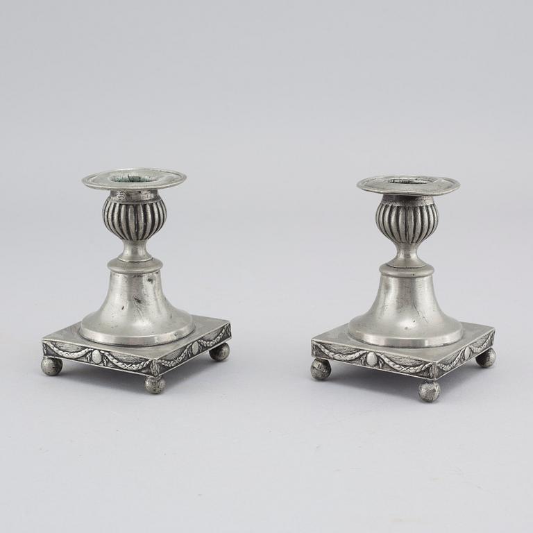 A pair of pewter candlesticks by Adolf Fredrik Moberg in Jönköping, 1824.