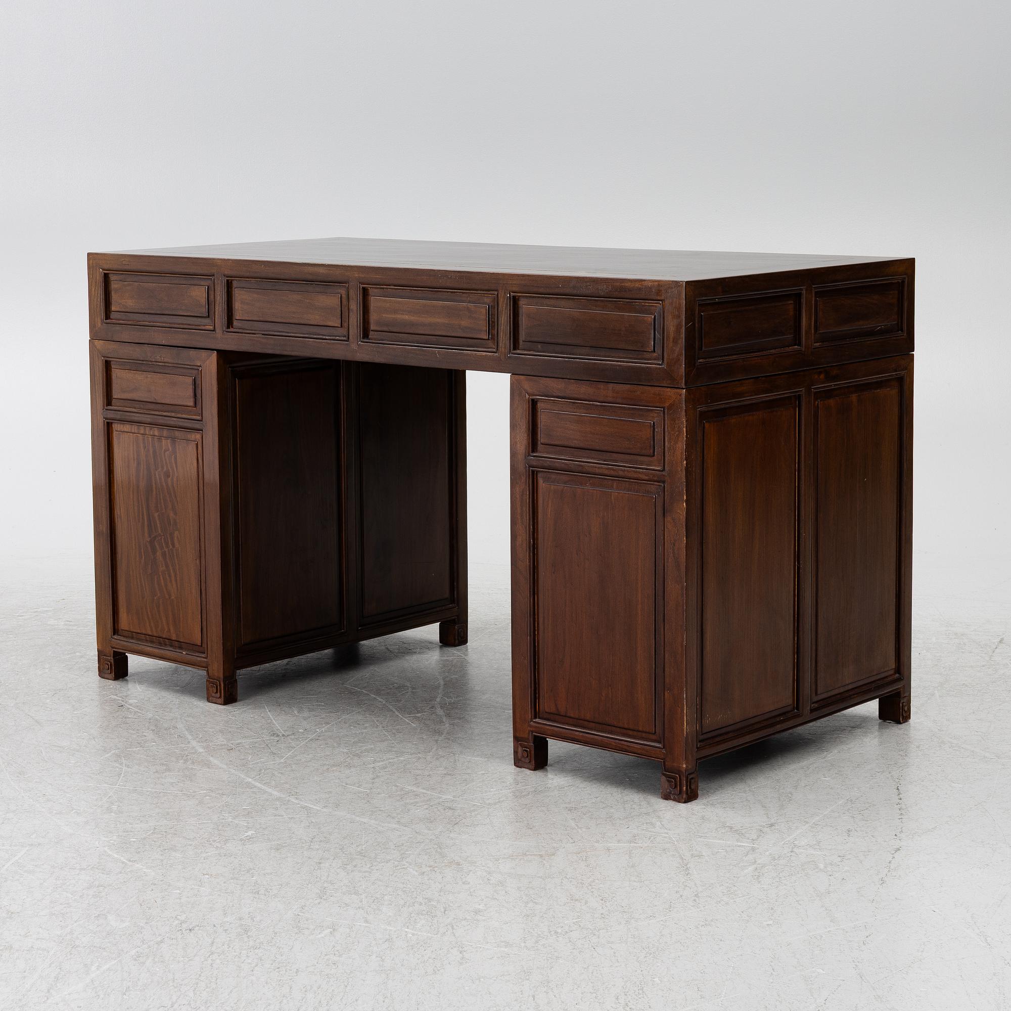 A Chinese hardwood desk, 20th century.