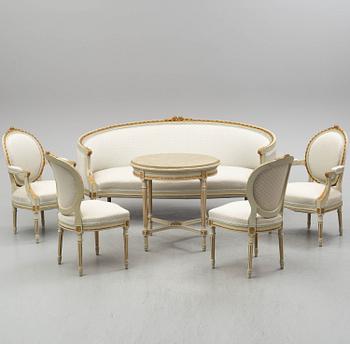 A sofa, four chairs and a table, gustavian style, early 20th century.