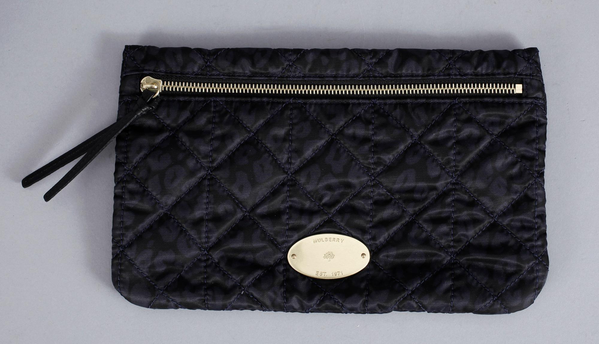 A toilet- and a make-up bag by Mulberry, "Rosie".