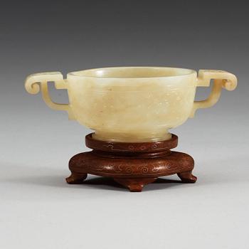 A carved nephrite cup, China.