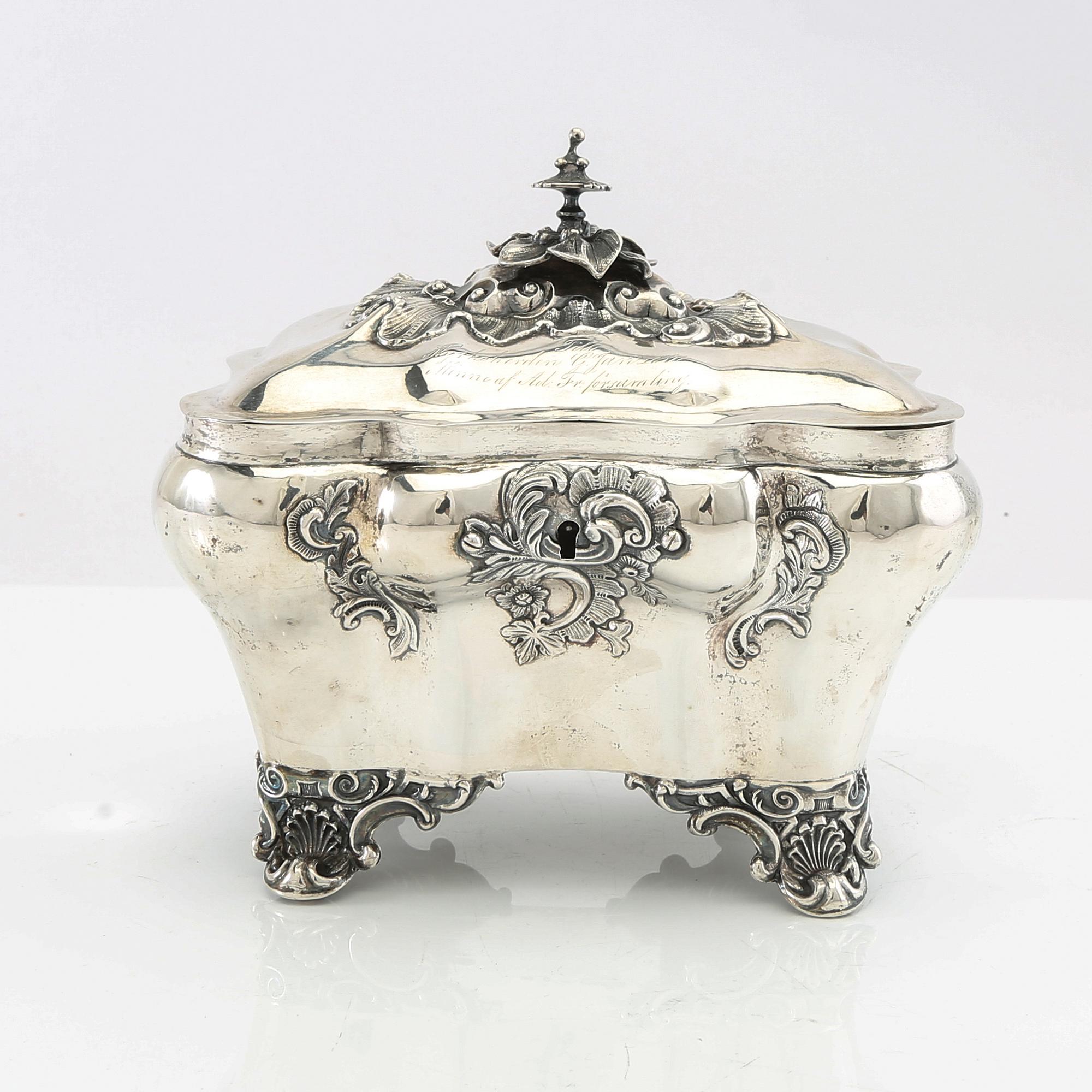 Christian Hammer sugar box with key, silver, Stockholm 1858, Neo-Rococo.