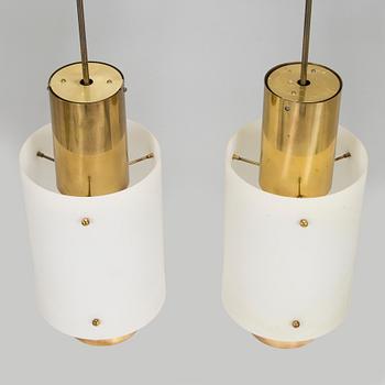 Paavo Tynell, a pair of 1950s pendant lights for Taito.