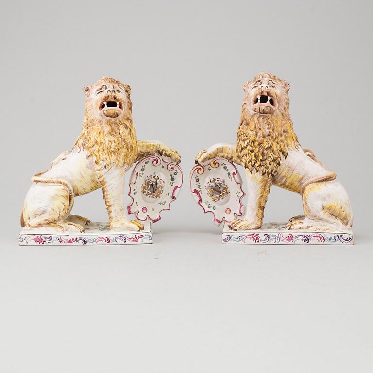 A PAIR OF FRENCH FAYENCE BOOK ENDS, 20th century.